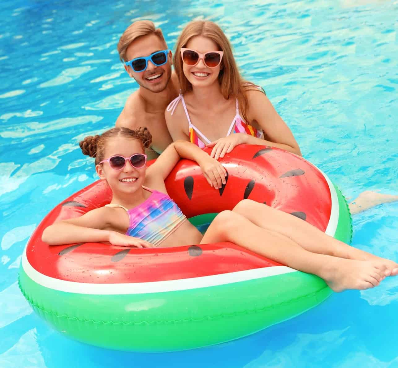 Happy Family in Above Ground Pool Above Ground Pool Sets